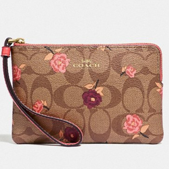 Coach Handbags - coach wristlet in signature canvas with peonies